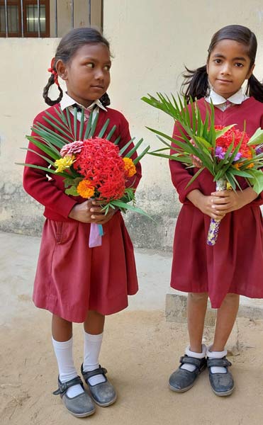 Students with flowers
